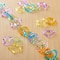 12 Packs: 200 ct. (2,400 total) Glitter Pastel Mixed Shape Chain Links by Creatology™